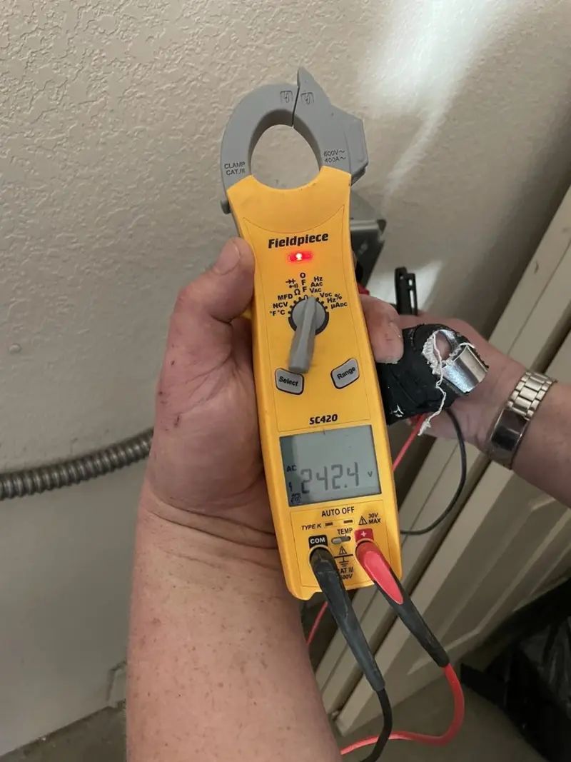 Voltage testing with clamp meter during Aluminum Wiring Replacement in Vergennes